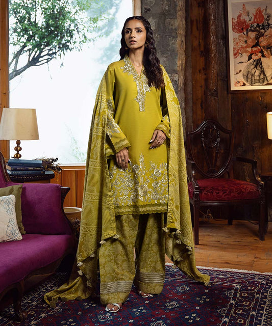 This is a Sapphire 3PEDY24DFV89 light khaddar 3-piece embroidered suit in yellow from the Signature Fall/Winter