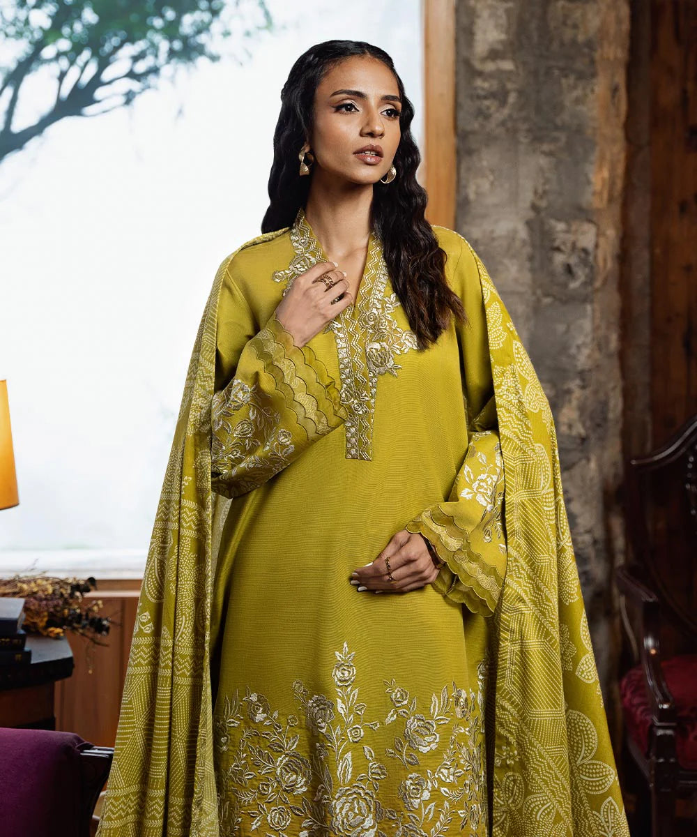 This is a Sapphire 3PEDY24DFV89 light khaddar 3-piece embroidered suit in yellow from the Signature Fall/Winter