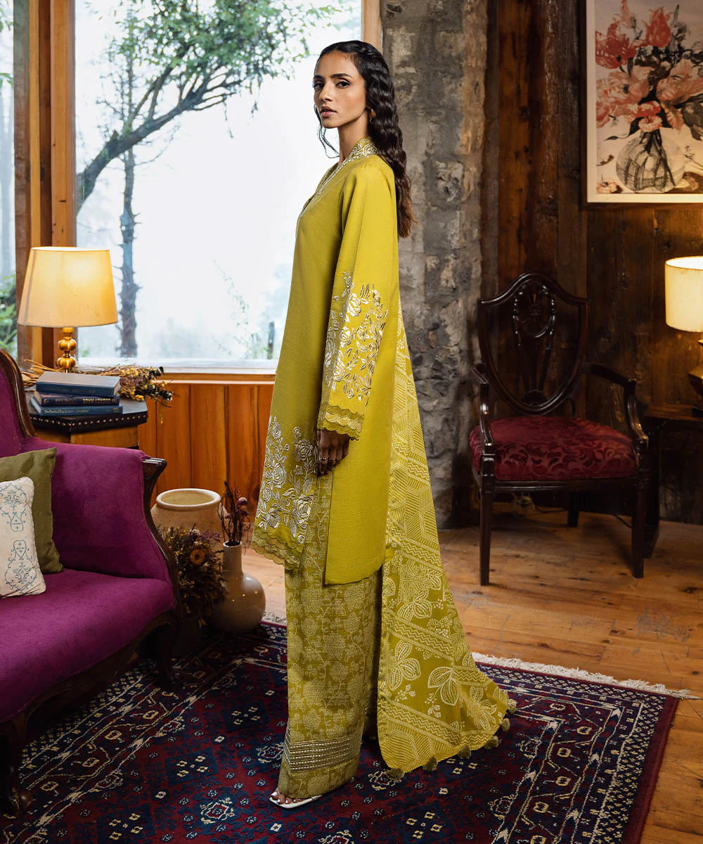 This is a Sapphire 3PEDY24DFV89 light khaddar 3-piece embroidered suit in yellow from the Signature Fall/Winter
