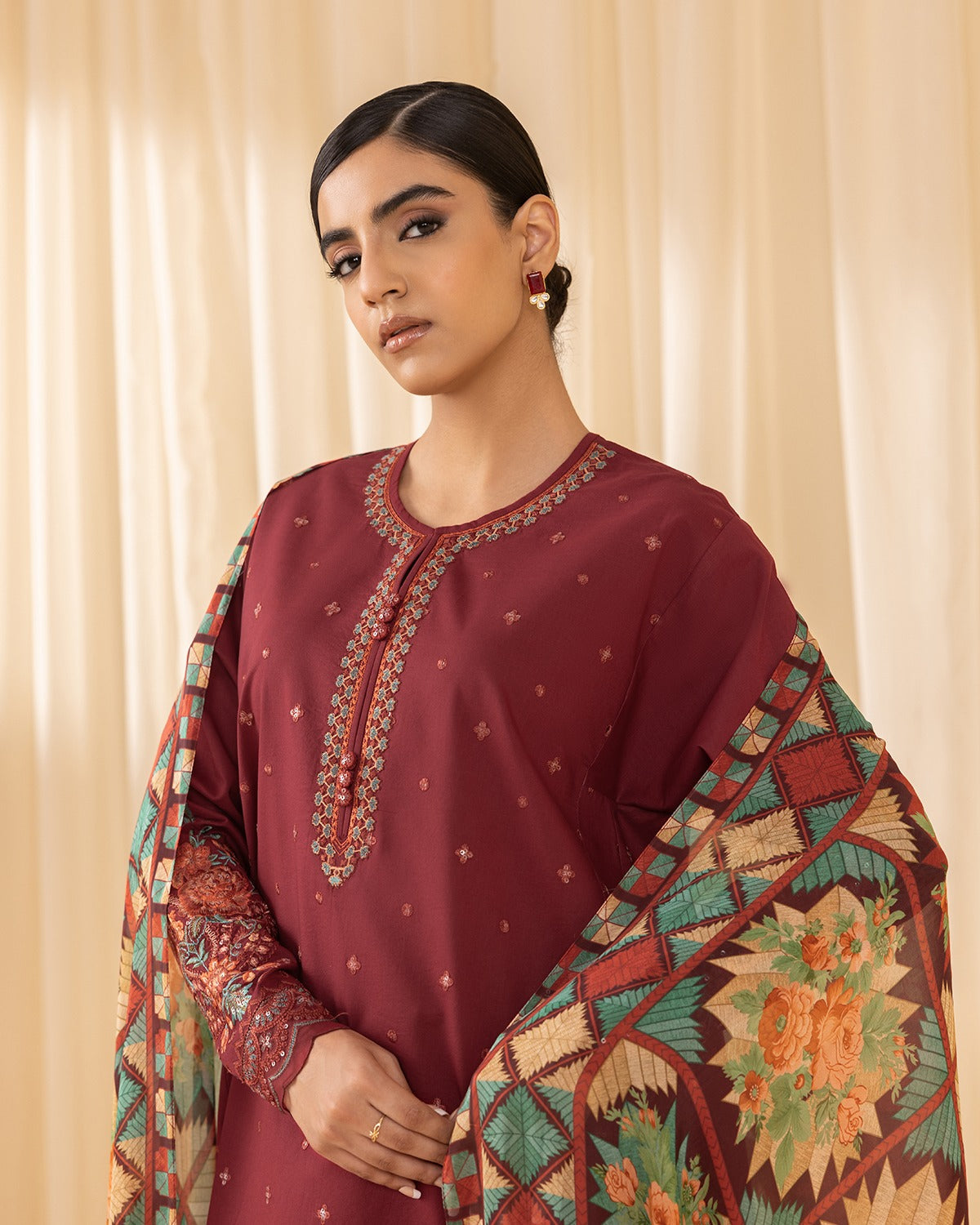 3pc embroidered crosshatch  This is a maroon embroidered cambric suit from Sapphire